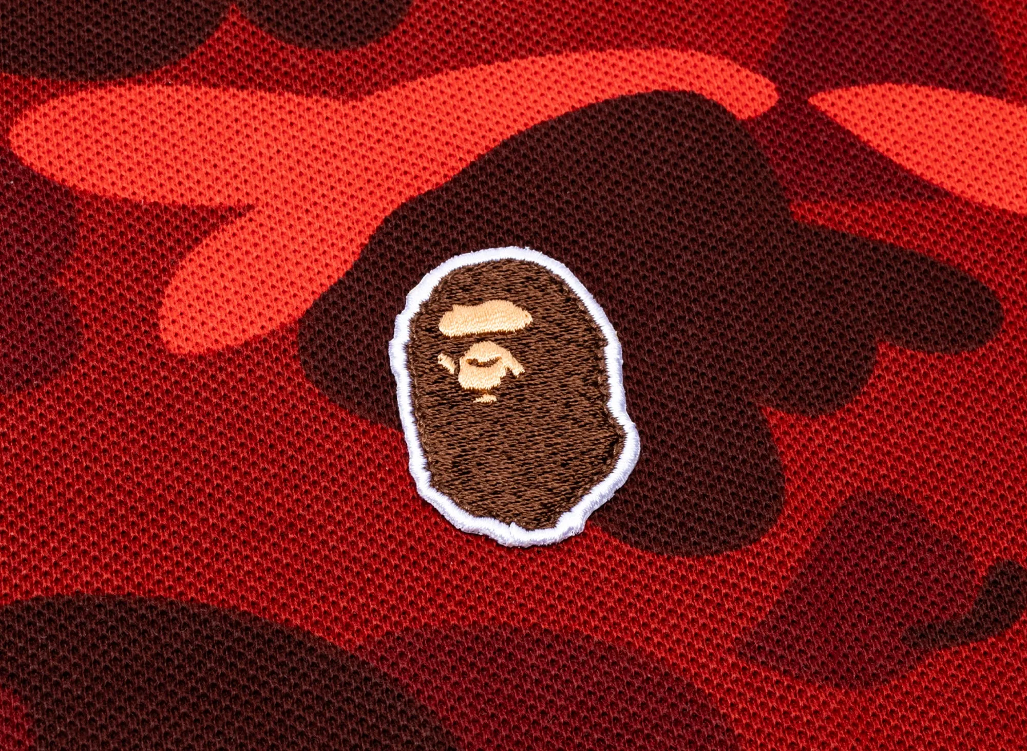 A Bathing Ape Color Camo Large Ape Head Relaxed Fit Polo Shirt in Red